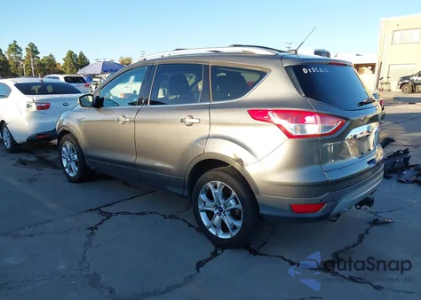 2014 Ford Escape Titanium z USA, uszkodzony, nr VIN 1FMCU0J90EUD17965
